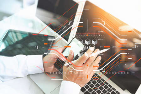 Blockchain technology concept with a chain of encrypted blocks.businessman working with laptop computer with fintech, financial cryptocurrency such as bitcoinの写真素材