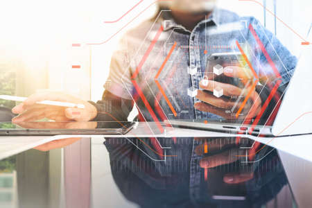 Blockchain technology concept with a chain of encrypted blocks.businessman working with laptop computer with fintech, financial cryptocurrency such as bitcoinの写真素材