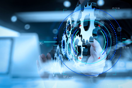 Concept of focus on target with digital diagram.double exposure of businessman hand show human gear...