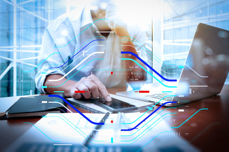 Concept of focus on target with digital diagram.business documents on office table with smart phone...