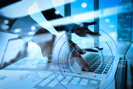 Concept of focus on target with digital diagram.double exposure of businessman hand working with...