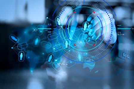 Concept of focus on target with digital diagram.Double exposure of businessman hand working with new...