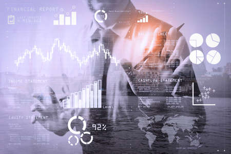 Financial report data of business operations (balance sheet and  income statement and diagram) as Fintech concept.Double exposure of success businessman open his hand with London building.の写真素材
