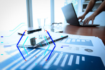 Concept of focus on target with digital diagram.business documents on office table with smart phone...