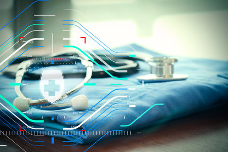 Health protection. Medical and health care concept.Stethoscope with blue doctor coat on wooden table with shallow DOF evenly matched and backgroundの写真素材