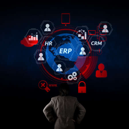 Architecture of ERP (Enterprise Resource Planning) system with connections between business intelligence (BI), production, CRM modules and HR diagram.businessman looking at 3d world with padlock as Internet security.の写真素材