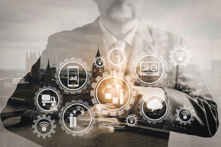 Smart factory and industry 4.0 and connected production robots exchanging data with internet of things (IoT) with cloud computing technology.の写真素材