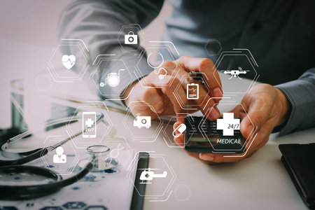 General Medical Services (GMS) and General Practitioners(GPs or family doctors) diagram.Healthcare costs and fees concept.Hand of smart doctor used a calculator for medical costs in modern hospital の写真素材