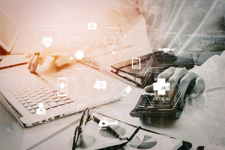 General Medical Services (GMS) and General Practitioners(GPs or family doctors) diagram.businessman hand working with finances about cost and calculator  and latop with mobile phone on withe desk.の写真素材