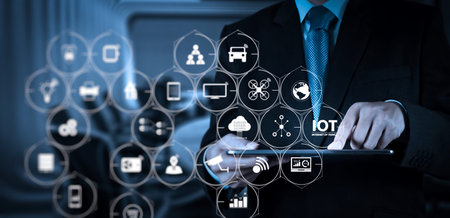 Internet of Things (IOT) technology with AR (Augmented Reality) on VR dashboard. Businessman hand...