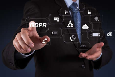 GDPR. Data Protection Regulation with Cyber security and privacy virtual diagram.businessman hand  working with touch screen in actionの写真素材