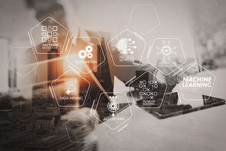 Machine learning technology diagram with artificial intelligence (AI),neural network,automation,data mining in VR screen.success businessman working in office with digital tablet laptop computer.の写真素材