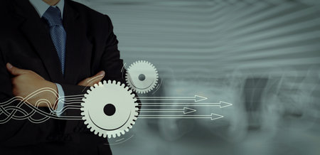 Thinking about structuring virtual diagram of business process with solutions. businessman success with his board room background as conceptの写真素材