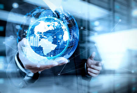 Intelligence (BI) and business analytics (BA) with key performance indicators (KPI) dashboard in VR globe form concept.Double exposure of businessman working with new modern computer show globe with social network.の写真素材