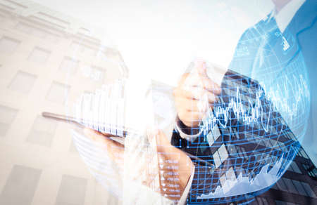 Intelligence (BI) and business analytics (BA) with key performance indicators (KPI) dashboard in VR globe form concept.Double exposure of success businessman with abstract buildingの写真素材