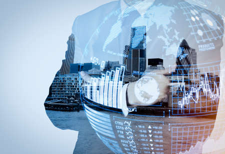 Intelligence (BI) and business analytics (BA) with key performance indicators (KPI) dashboard in VR globe form concept.Double exposure of success businessman with abstract buildingの写真素材