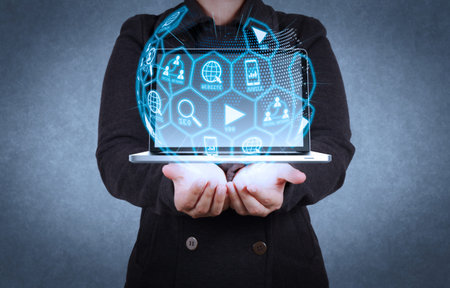 Digital marketing media (website ad, email, social network, SEO, video, mobile app) in virtual globe shape diagram.designer hand show cloud network sign as conceptの写真素材