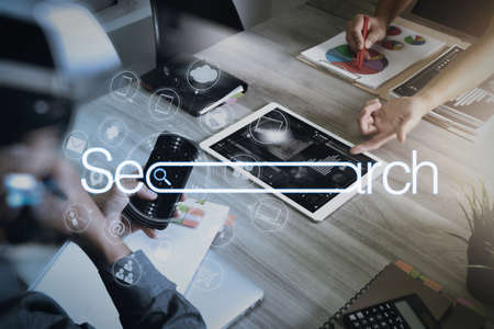 Searching Browsing Internet Data Information Networking Concept with blank search bar.Designer Businessman hand using smart phone,mobile payments online shopping,omni channel.の写真素材