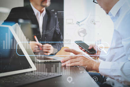 Searching Browsing Internet Data Information Networking Concept with blank search bar.co working team meeting concept,businessman using smart phone and digital tablet and laptop computer.の写真素材
