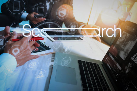 Searching Browsing Internet Data Information Networking Concept with blank search bar.Designer Businessman hand using smart phone,mobile payments online shopping,omni channel.の写真素材