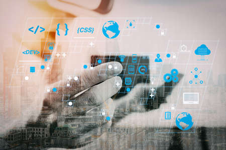 Coding software developer work with AR new design dashboard computer icons of scrum agile development and code fork and versioning with responsive cybersecurity.businessman wearing virtual reality gogglesの写真素材