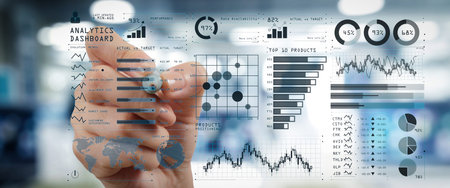 Intelligence (BI) and business analytics (BA) with key performance indicators (KPI) dashboard concept.business documents on office table with smart phone and digital tablet and graph on wide screen computer.の写真素材