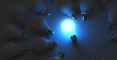 Glowing Light Bulb between the others on blue light background. Leadership, innovation, great idea...