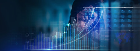 Businessman working with modern computer virtual dashboard analyzing finance sales data and economic...