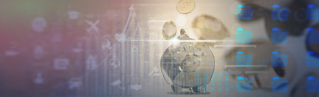 3d Coins flowing with silver  piggy bank and stock market graph with candlestick chart suitable for finance investment and insurance conceptの写真素材