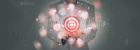 Targeting the business concept,businessman hand showing vurtual 3d pointing target symbol as success business technology.の写真素材