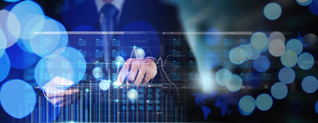 Businessman working with modern computer virtual dashboard analyzing finance sales data and economic growth graph chart and block chain technology.の写真素材
