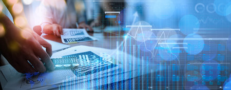 Businessman using smartphone data progress of business and financial and investment data,network and analysis customer growth graph,colleague business planning,strategy and development meeting team.の写真素材