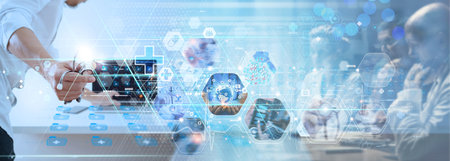 Healthcare and medical.Doctor working with laptop computer show blue cross of healthcare with and medical diagnosis of patient. Digital healthcare and network connection global and data research concept.の写真素材