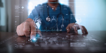 Cardiologist doctor examine patient heart functions and blood vessel on virtual interface. Medical technology and healthcare treatment to diagnose heart disorder concept.の写真素材
