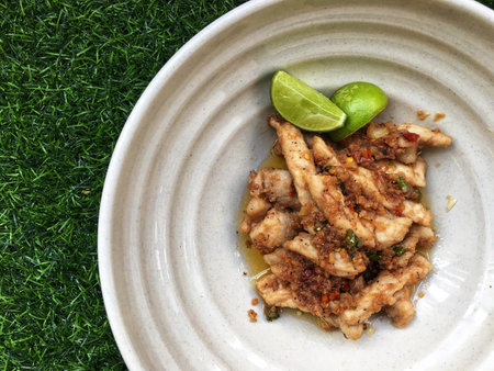 Wok-fried shrimp paste with pork, garlic, chilies and lime