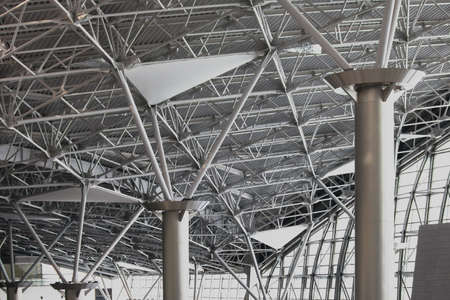 The structure of a steel roof frame for building construction on supports made of round pipes.の写真素材
