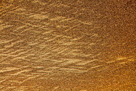 The texture of the sand of the sea , golden sandy beach.の写真素材