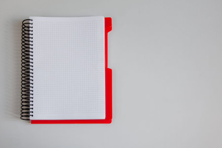 Blank notepad mockup on a white background. Spring concept.