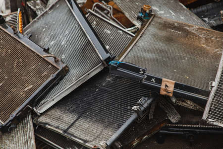 Scrap metal, used car radiators in a scrap yard.の写真素材