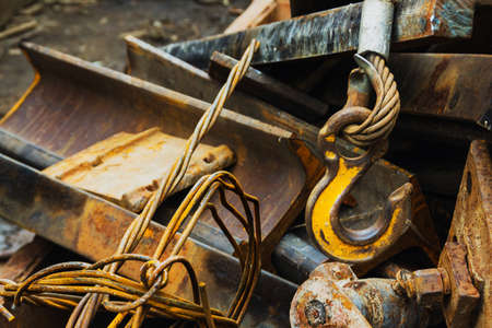 Scrap yard, crane hook, metal waste disposal.の写真素材