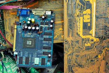 Old computer chip, garbage disposal in a junkyard.