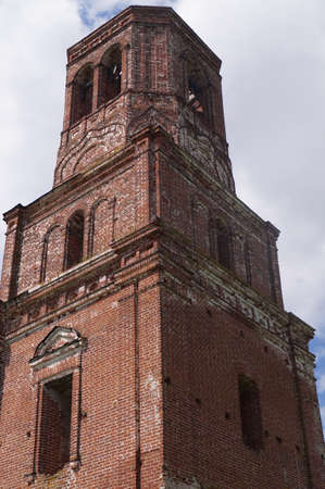 Tower against a cloudy sky backgroundの写真素材