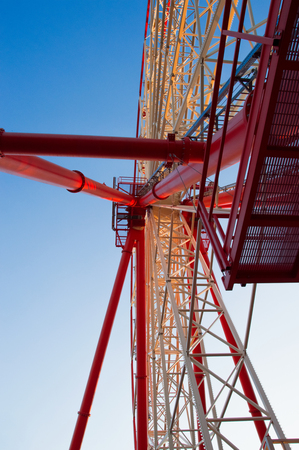 Ferris Wheel Detail -- a massive steel structure with intricate support beamsの写真素材