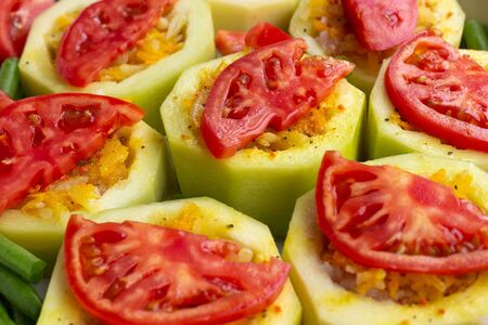 stuffed zucchini with tomatoes and green beansの写真素材