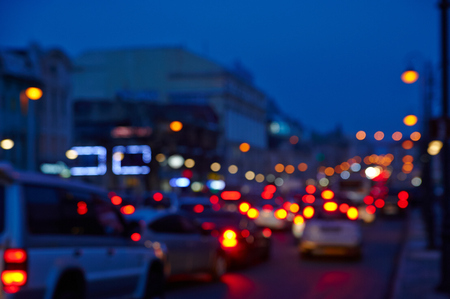 Images of the city at night is blurred for a background texture abstract lights glowの写真素材