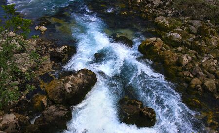 Stormy mountain streamの写真素材