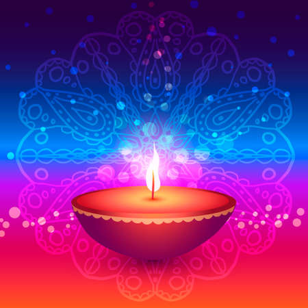 Diwali lamp glowing on a multicolored backgroundの写真素材