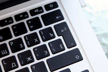 Close up of keyboard of a modern laptop. Enter button.の写真素材