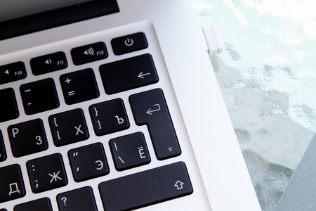 Close up of keyboard of a modern laptop. Enter button.の写真素材