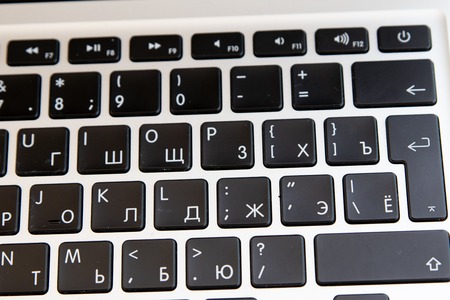 Close up of keyboard of a modern laptop. Enter button.の写真素材